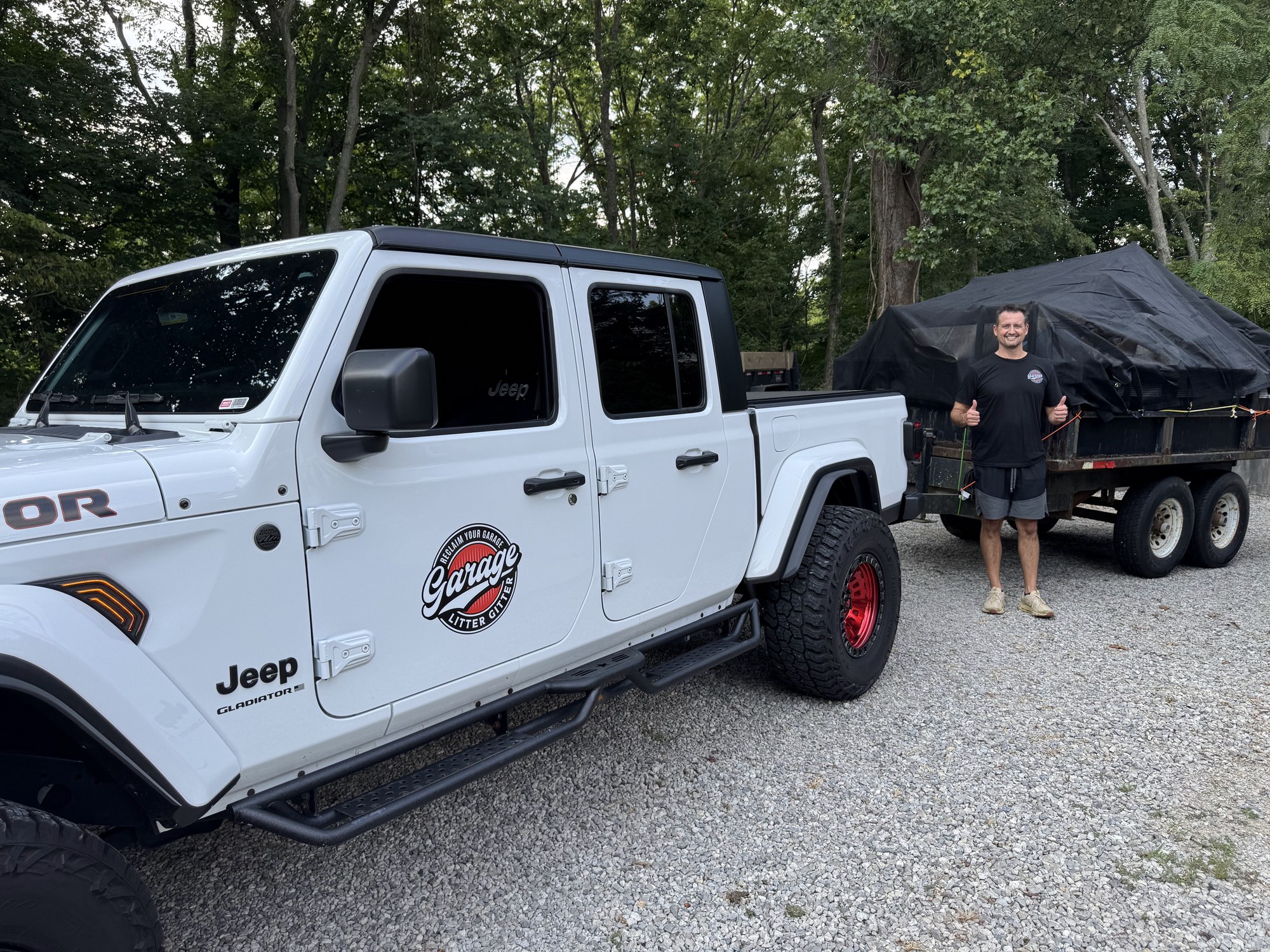 Garage Litter Gitter owner with truck and loaded dump trailer serving Dayton and Cincinnati garage transformations