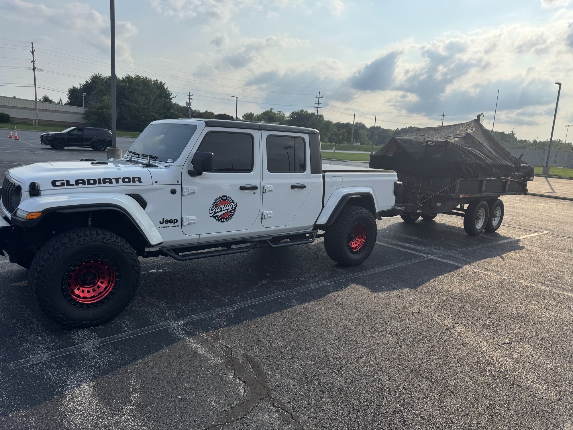 Garage Litter Gitter truck and dump trailer ready for garage transformations in Cincinnati Tri-State